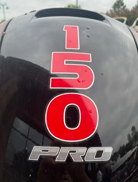 Slide: The Image of Close-up of a 2024 Nitro Z18 boat engine with 150 PRO label. - 16