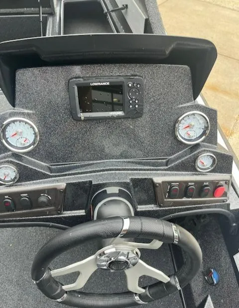 Slide: The Image of 2024 Nitro Z18 boat dashboard with Lowrance display and gauges. - 7