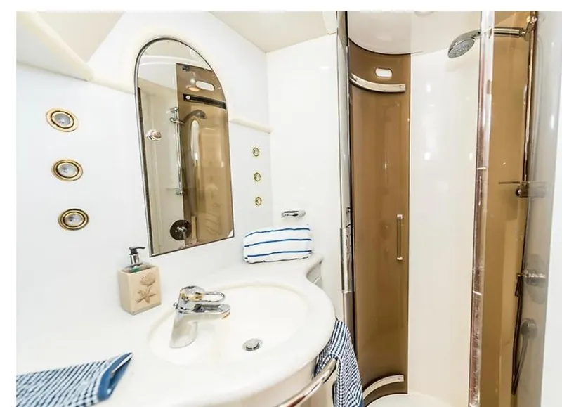 Slide: The Image of Luxurious bathroom in 1997 Sunseeker MANHATTAN yacht with modern fixtures and shower. - 15