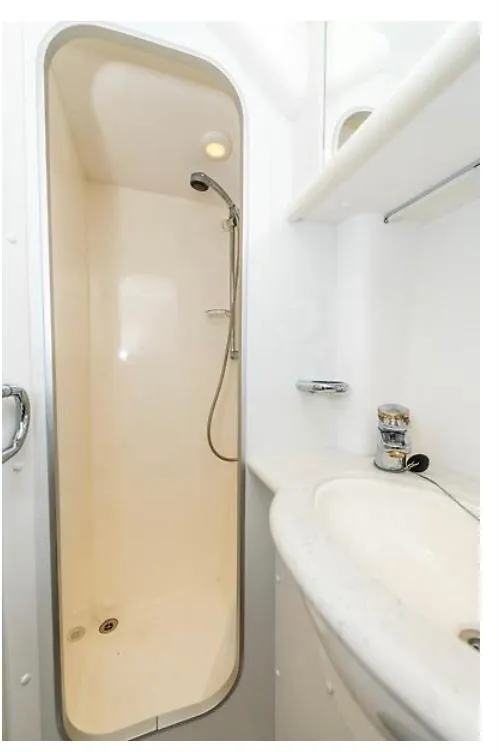 Slide: The Image of Shower and sink area in 1997 Sunseeker Manhattan yacht bathroom. - 23