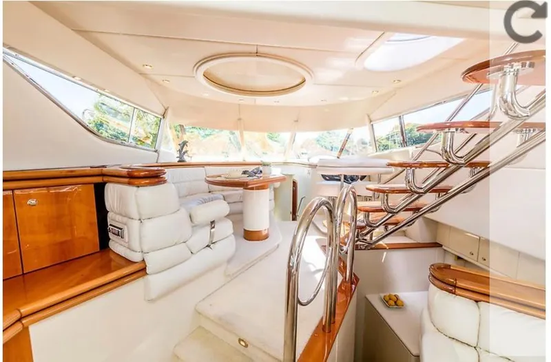 Slide: The Image of Luxurious interior of a 1997 Sunseeker Manhattan yacht with elegant seating and modern design. - 3