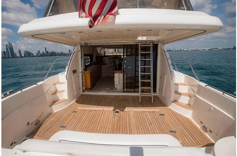 Slide: The Image of 1997 Sunseeker MANHATTAN yacht deck with ocean view and city skyline. - 33