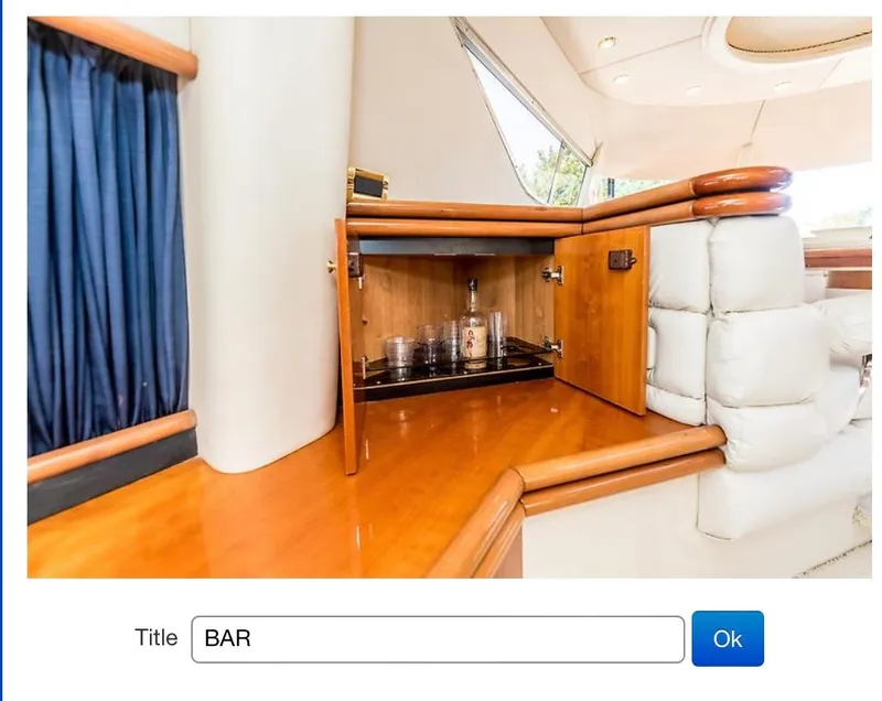 Slide: The Image of Luxurious wooden bar area inside a 1997 Sunseeker MANHATTAN yacht. - 6