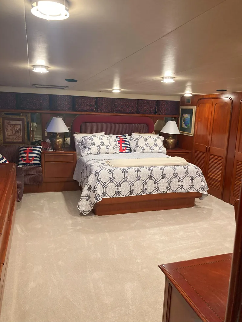 Slide: The Image of Luxurious bedroom in a 1988 Viking 70 Cockpit Motor Yacht. - 45