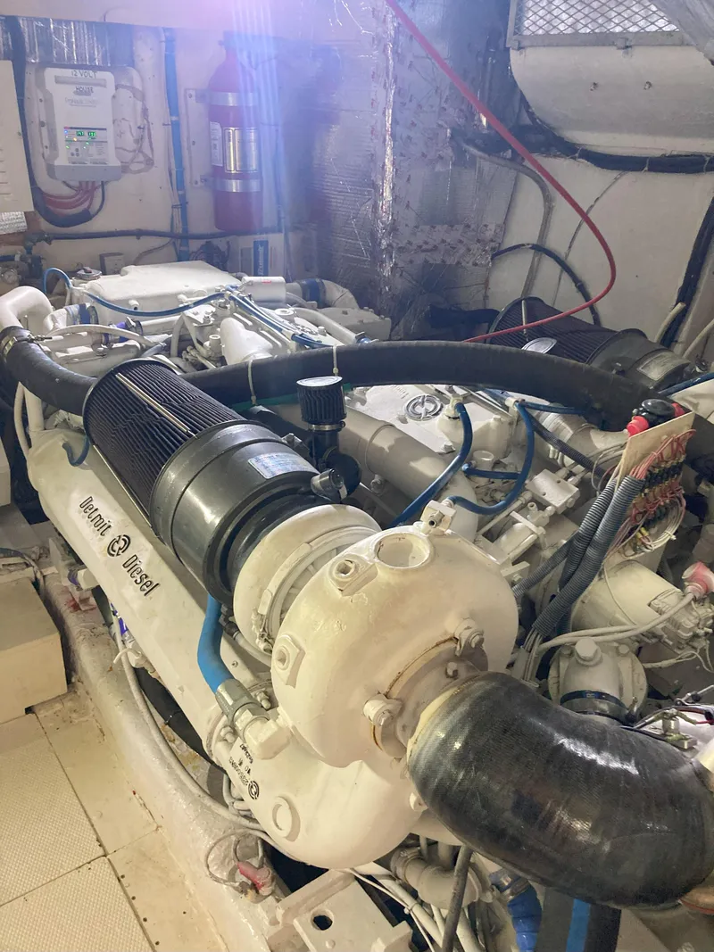 Slide: The Image of Engine room of a 1988 Viking 70 Cockpit Motor Yacht with a powerful marine diesel engine. - 53