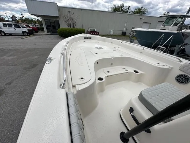 Slide: The Image of 2024 Carolina Skiff 23 LX boat interior at a dealership. - 20