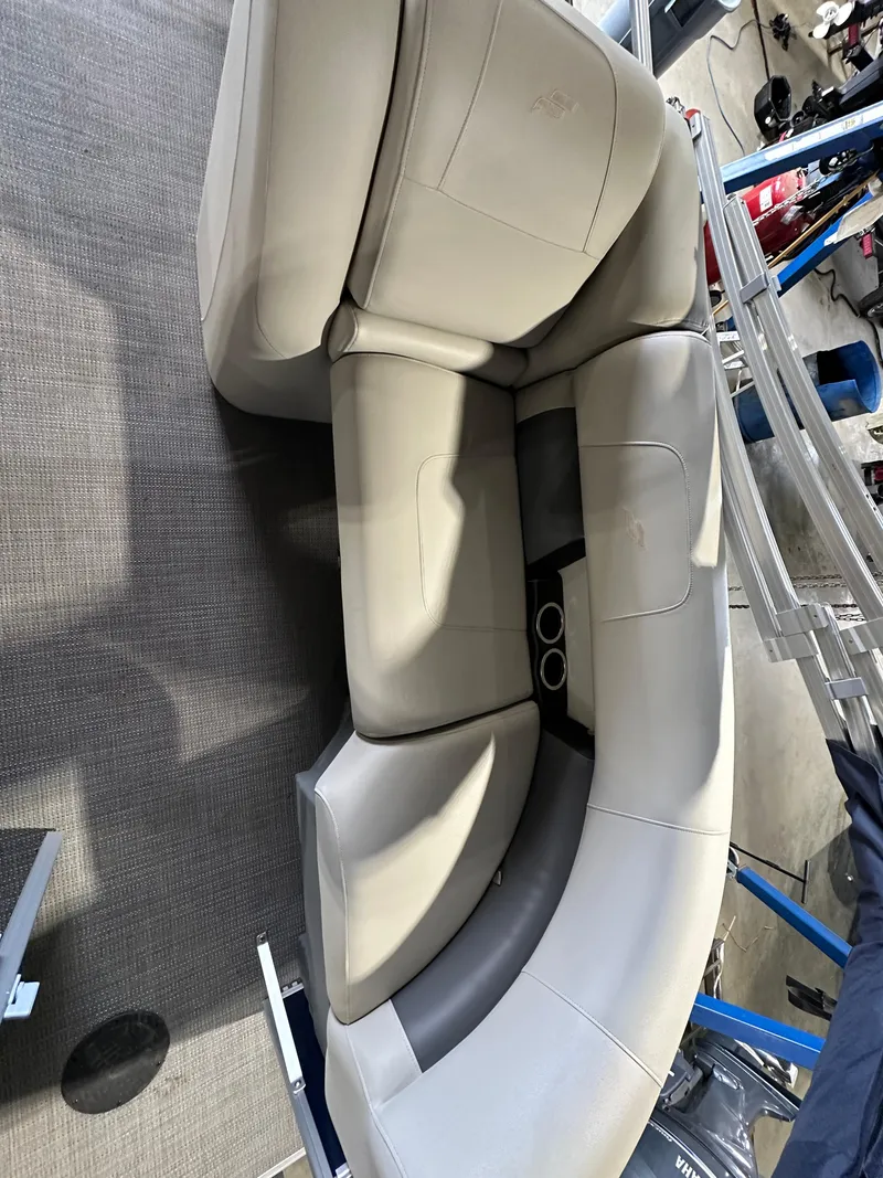 Slide: The Image of 2024 Starcraft LX22RDH boat interior seating with cup holders - 3