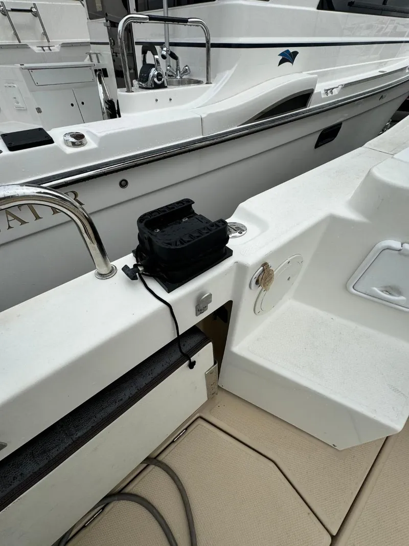 Slide: The Image of 2017 Cutwater C28 boat deck with railing and equipment. - 4