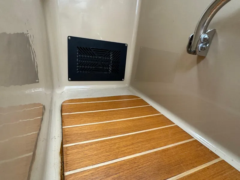 Slide: The Image of 2017 Cutwater C28 interior with wooden flooring and vent detail. - 41