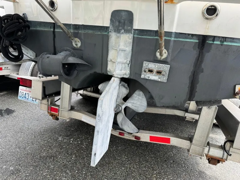 Slide: The Image of 2017 Cutwater C28 boat stern with propeller and rudder on a trailer. - 44