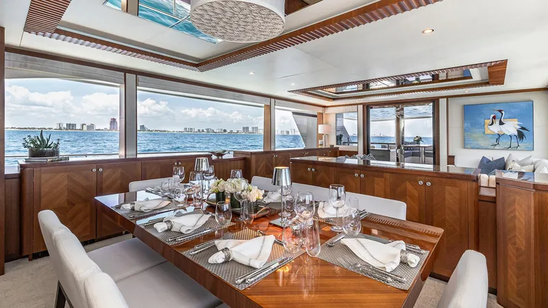 Slide: The Image of Luxurious dining area on a 2015 Ocean Alexander Motoryacht Open Bridge. - 14