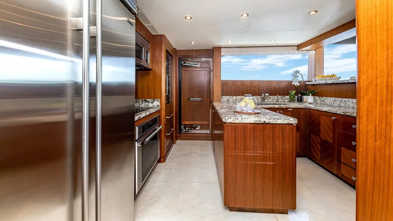 Slide: The Image of Luxurious kitchen interior of 2015 Ocean Alexander Motoryacht Open Bridge with modern appliances. - 22