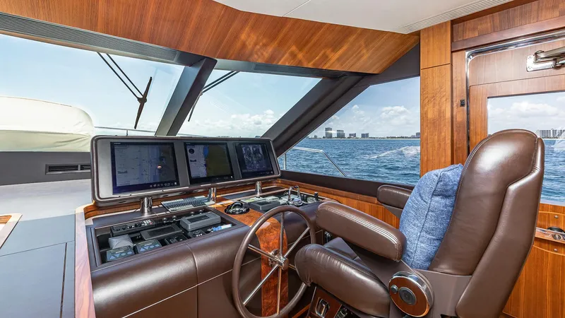 Slide: The Image of Luxurious helm station of 2015 Ocean Alexander Motoryacht Open Bridge with panoramic ocean view. - 24