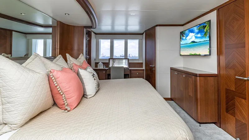 Slide: The Image of Luxurious bedroom in 2015 Ocean Alexander Motoryacht Open Bridge with elegant decor and ocean view. - 32