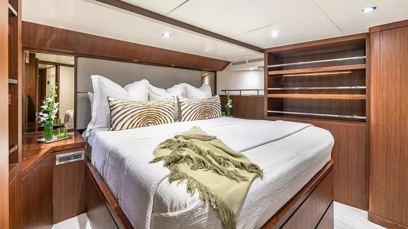 Slide: The Image of Luxurious bedroom in 2015 Ocean Alexander Motoryacht Open Bridge with modern wood finishes. - 36