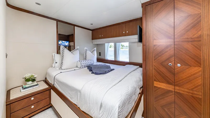 Slide: The Image of Luxurious bedroom in 2015 Ocean Alexander Motoryacht Open Bridge with elegant wood finishes. - 38
