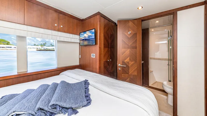 Slide: The Image of Luxurious bedroom in 2015 Ocean Alexander Motoryacht Open Bridge with ensuite bathroom. - 39