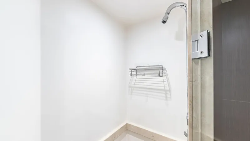 Slide: The Image of Shower area in 2015 Ocean Alexander Motoryacht Open Bridge with wall-mounted rack. - 45