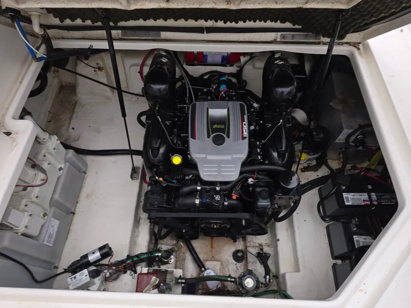 Slide: The Image of Engine compartment of a 2015 Sea Ray 260 Sundancer boat. - 10