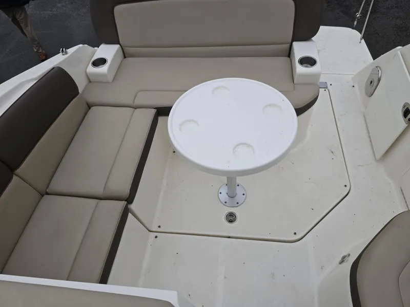 Slide: The Image of Interior seating area of 2015 Sea Ray 260 Sundancer with round table. - 3
