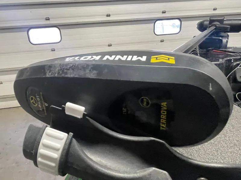 Slide: The Image of Minn Kota Terrova trolling motor on a 2020 Nitro ZV21 boat in a garage. - 12