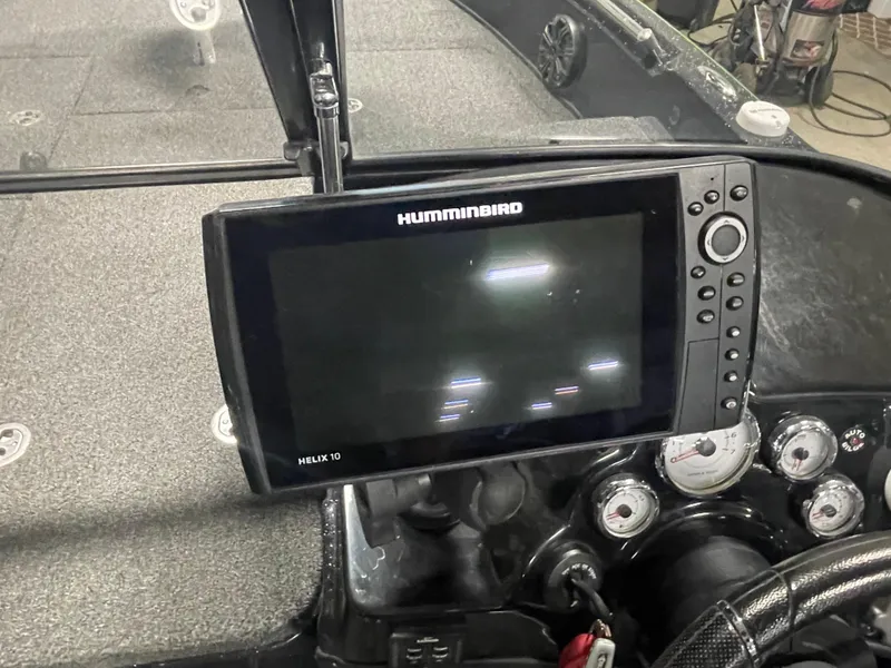Slide: The Image of 2020 Nitro ZV21 boat with Humminbird Helix 10 fish finder and navigation system. - 8