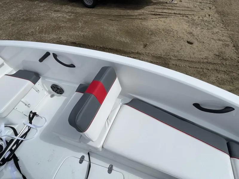 Slide: The Image of 2024 Tahoe T16 boat interior with white and gray seating. - 15