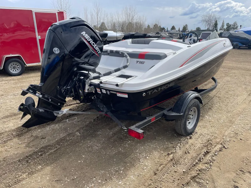 Slide: The Image of 2024 Tahoe T16 boat with Mercury outboard motor on a trailer. - 3