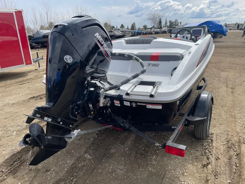 Slide: The Image of 2024 Tahoe T16 boat with Mercury outboard motor on a trailer. - 5
