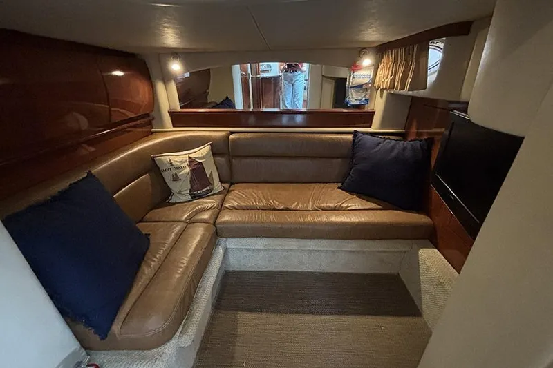 Slide: The Image of Luxurious interior of 2006 Sea Ray 44 Sundancer yacht with leather seating and cushions. - 33