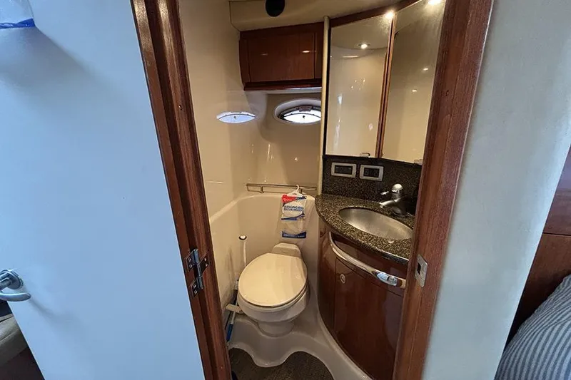 Slide: The Image of Luxurious bathroom in 2006 Sea Ray 44 Sundancer yacht with modern amenities. - 46