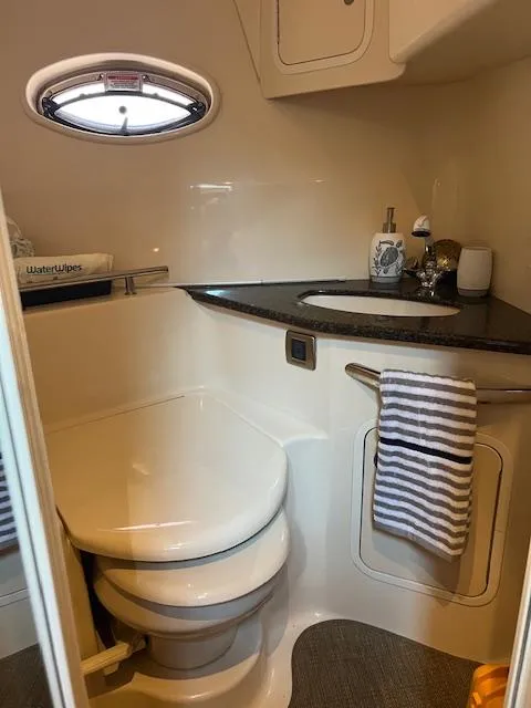 Slide: The Image of Interior of 2006 Sea Ray 44 Sundancer yacht with elegant seating and sleek design. - 7