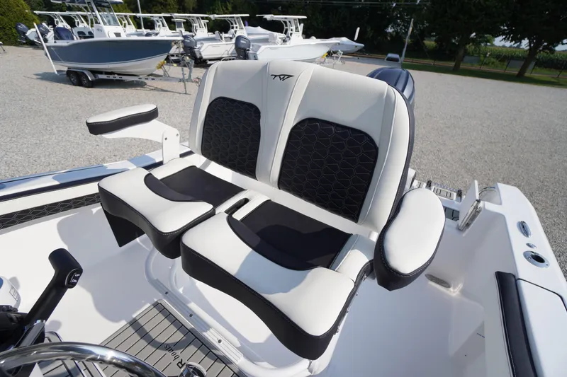 Slide: The Image of 2026 Tidewater 210 CC Adventure boat seating with modern design and comfortable upholstery. - 31