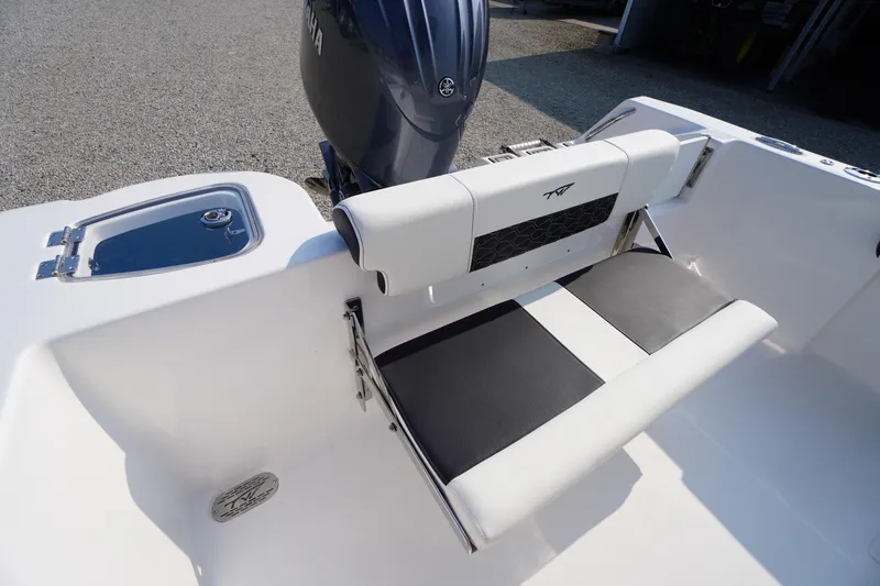 Slide: The Image of 2026 Tidewater 210 CC Adventure boat with sleek seating and Yamaha engine. - 36