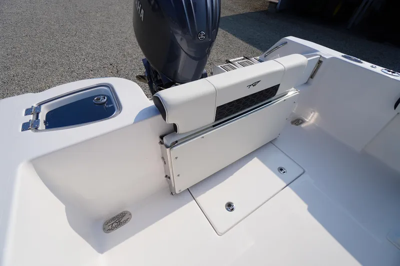 Slide: The Image of 2026 Tidewater 210 CC Adventure boat interior with Yamaha engine and seating. - 39