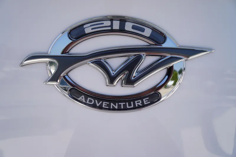 Slide: The Image of 2026 Tidewater 210 CC Adventure logo on a sleek white surface. - 4