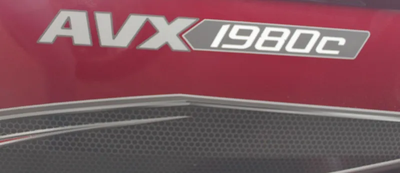 Slide: The Image of Close-up of 2024 Vexus AVX1980C logo on a red background. - 13