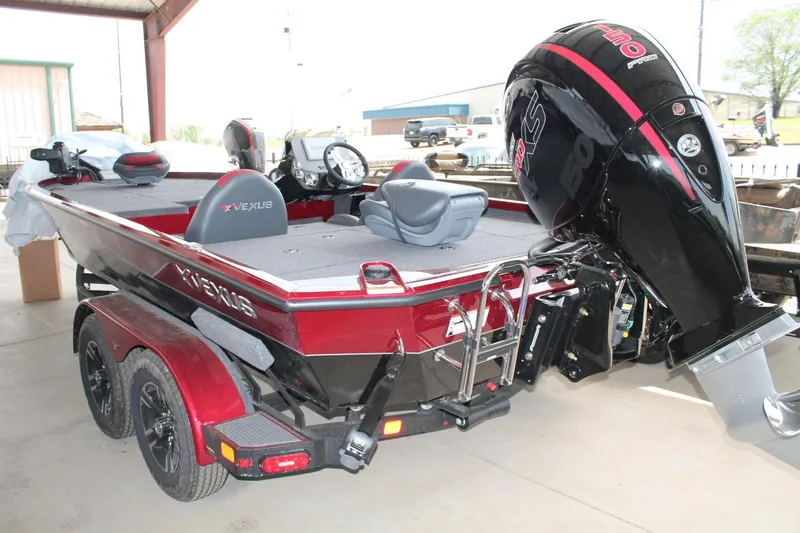 Slide: The Image of 2024 Vexus AVX1980C fishing boat with 150 HP outboard motor, red and black color scheme. - 14