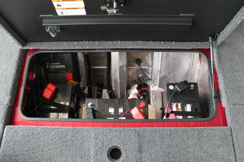 Slide: The Image of Battery compartment of 2024 Vexus AVX1980C boat with Minn Kota Precision charger. - 23