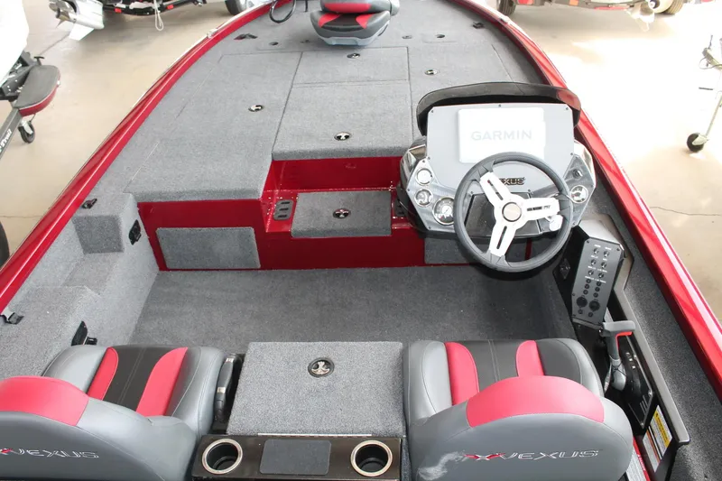 Slide: The Image of 2024 Vexus AVX1980C boat interior with Garmin navigation system and dual seating. - 4