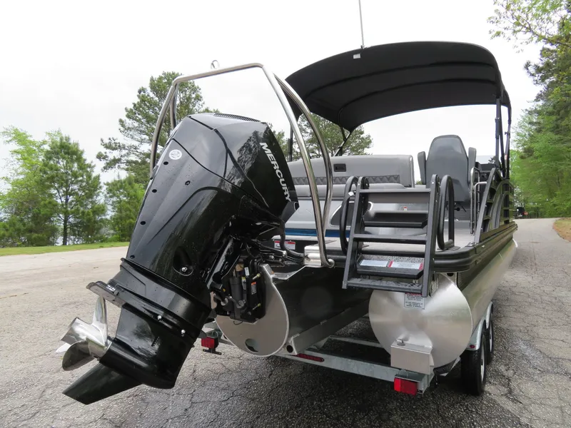 Slide: The Image of 2024 Bennington 23RSB pontoon boat with Mercury outboard motor. - 4