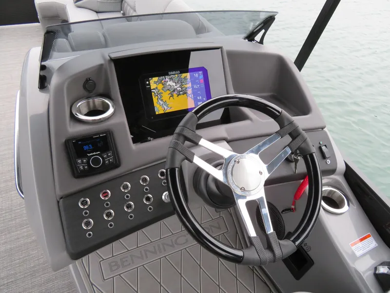 Slide: The Image of 2024 Bennington 23RSB helm with navigation system and controls. - 5