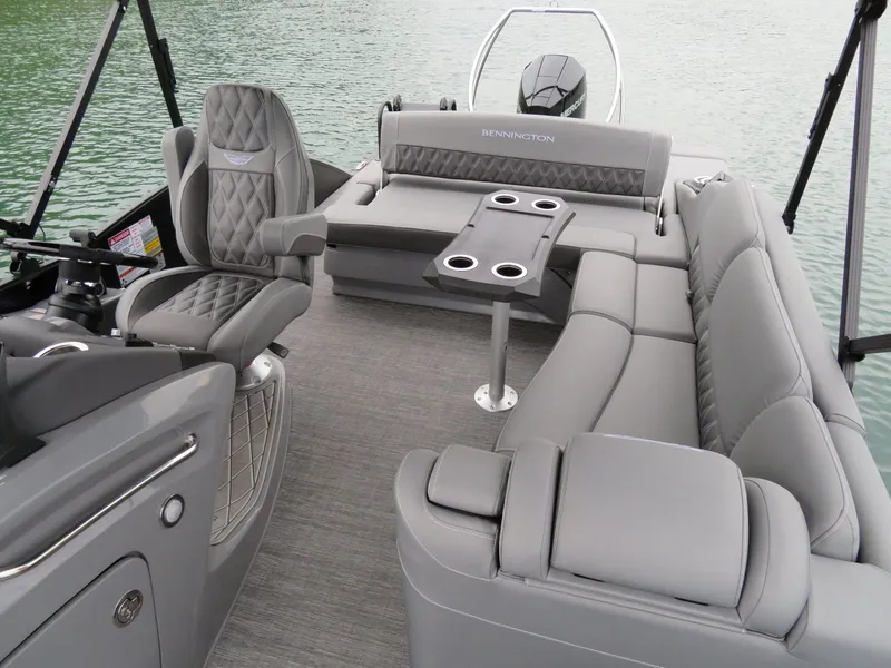 Slide: The Image of Interior of 2024 Bennington 23RSB pontoon boat with gray leather seating. - 7