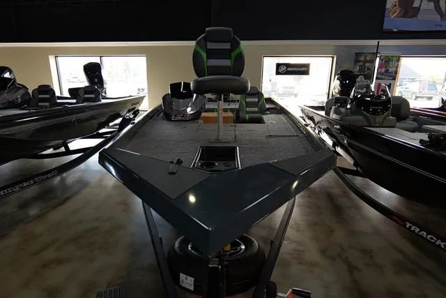 Slide: The Image of 2024 Ranger RT178 fishing boat displayed in showroom. - 3