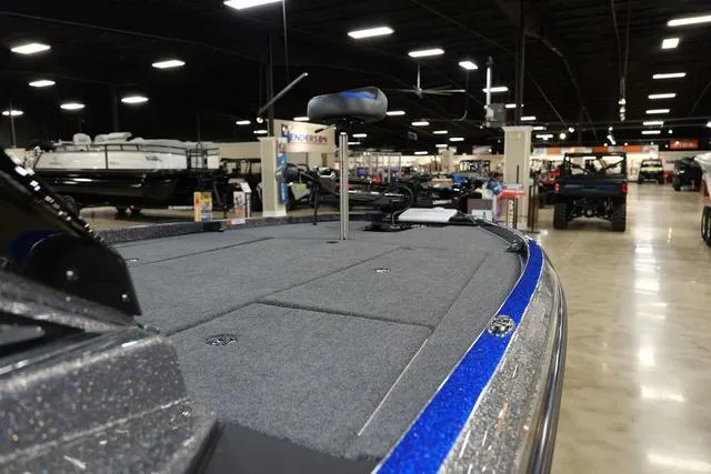 Slide: The Image of 2024 Ranger RZ521RC fishing boat on display in showroom. - 4