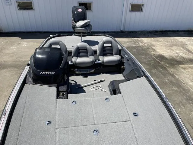 Slide: The Image of 2010 Nitro Z9 fishing boat with seating and storage compartments. - 3
