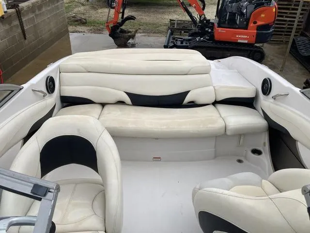 Slide: The Image of Interior of 2012 Tahoe Q8SSI boat with white leather seating. - 10