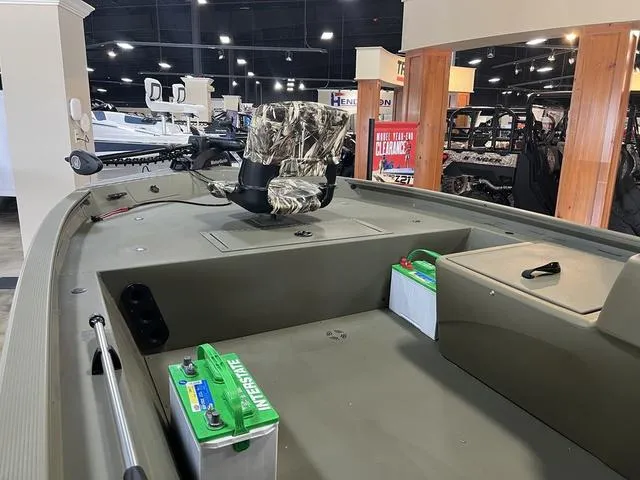 Slide: The Image of 2024 Tracker 1754SC boat with Mercury 60 outboard motor in showroom. - 4