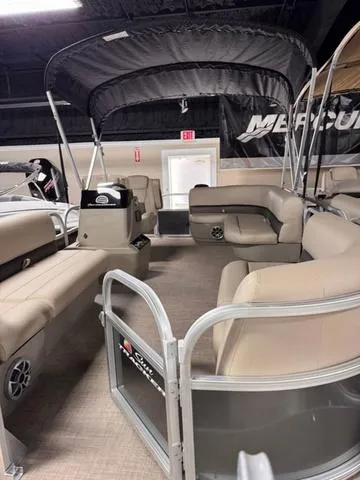 Slide: The Image of 2024 Sun Tracker PARTY BARGE® 16 DLX pontoon boat on trailer. - 3