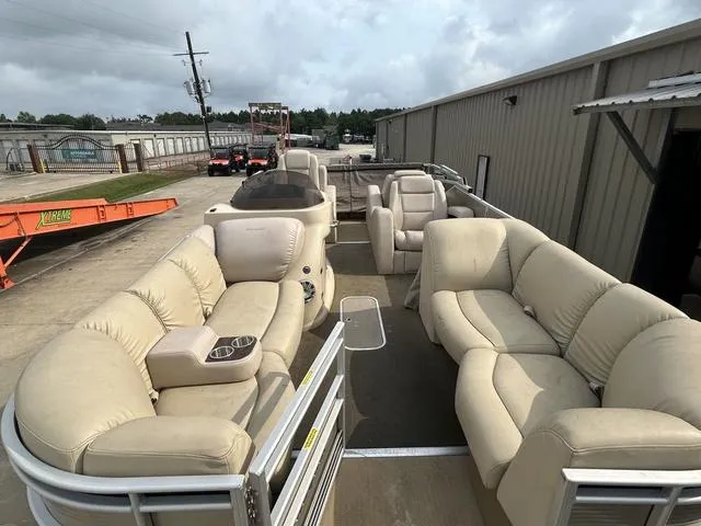 Slide: The Image of 2015 Godfrey SANPAN 2200 SLR pontoon boat with beige seating and spacious layout. - 6